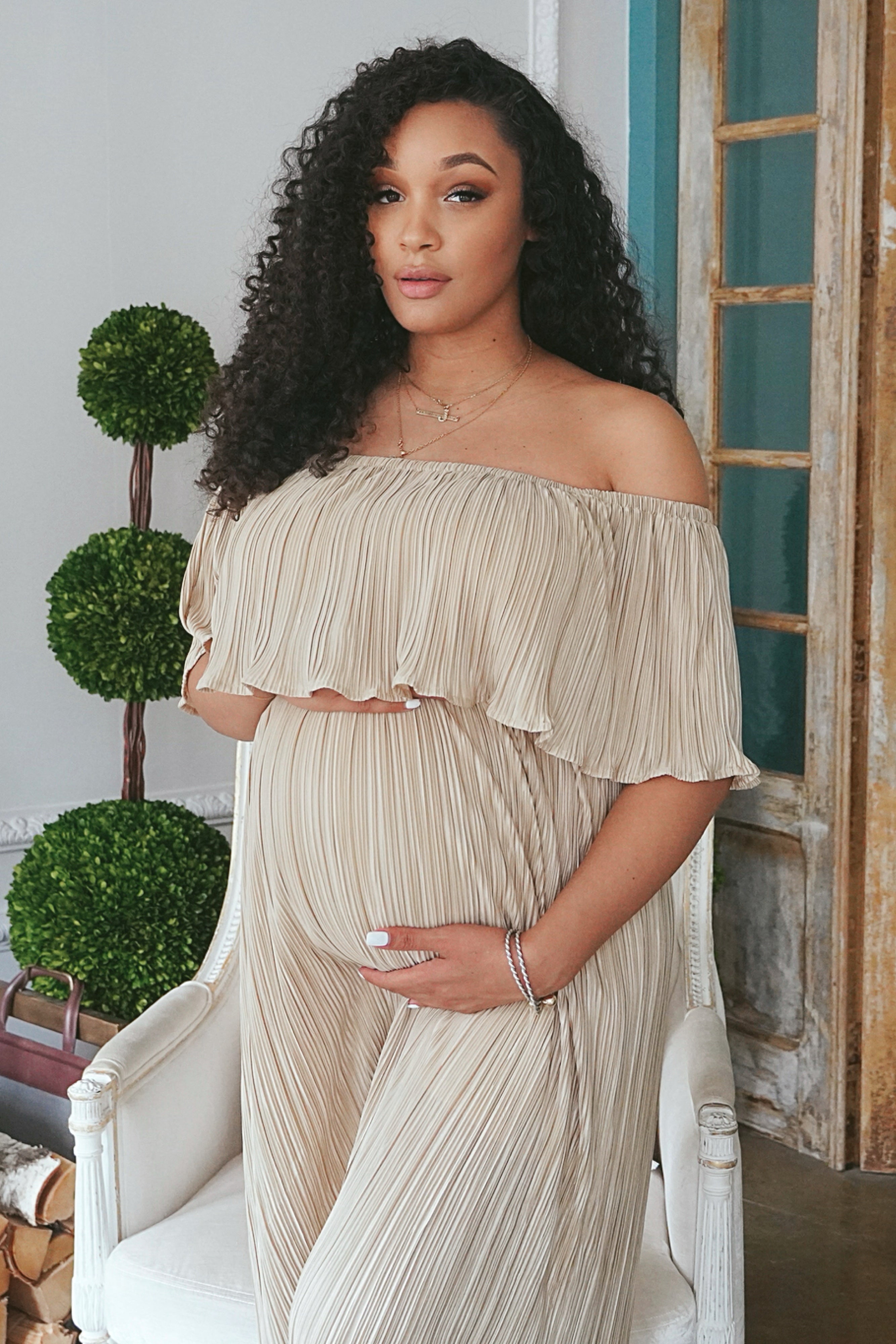 Gold pleated Metallic Maternity Maxi dress for a Pregnant Guest Chic Bump Club